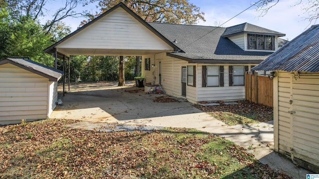 view of front of home featuring a carport