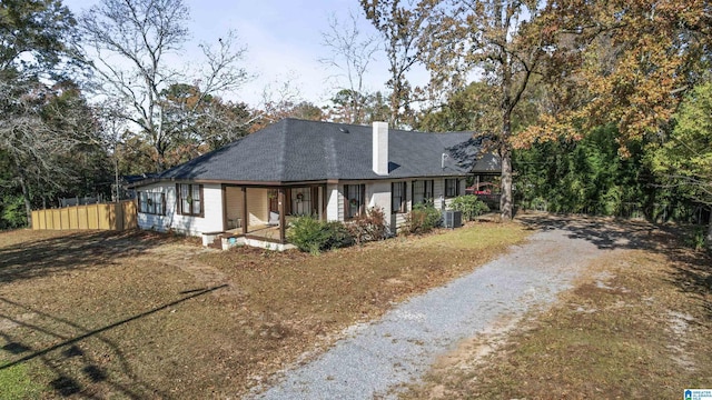 view of front of home featuring central AC unit and a porch