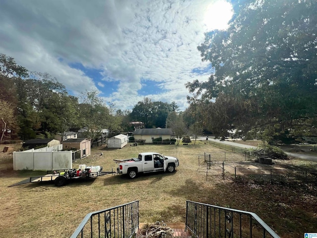 view of yard with a storage shed