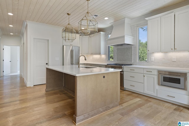 6558 Deerfoot Crossing Rd, Trussville, AL 35173 - kitchen featuring high end appliances, a sink, premium range hood, wood ceiling, and a chandelier