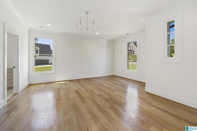 6558 Deerfoot Crossing Rd, Trussville, AL 35173 - unfurnished room featuring a chandelier, baseboards, light wood finished floors, ornamental molding, and recessed lighting