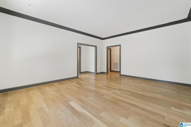 6558 Deerfoot Crossing Rd, Trussville, AL 35173 - spare room with ornamental molding, light wood finished floors, and baseboards