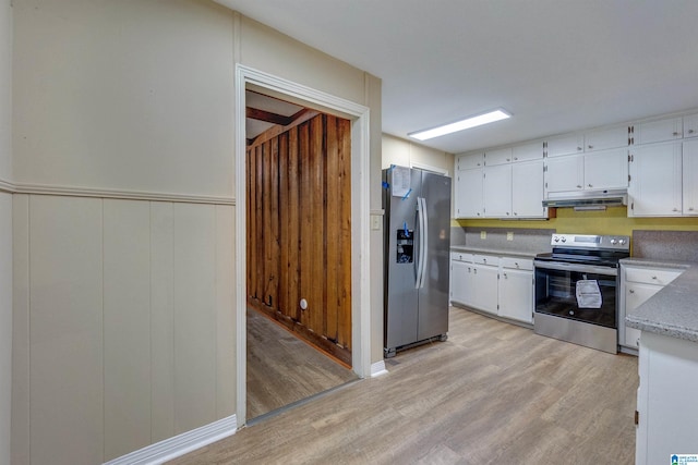 kitchen with white cabinetry, light wood-type flooring, and appliances with stainless steel finishes