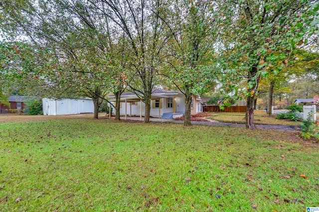 view of front of property with a front lawn