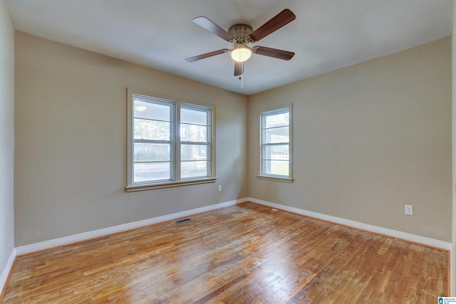 unfurnished room featuring ceiling fan and light hardwood / wood-style flooring