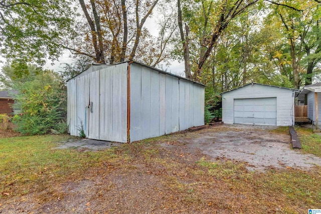 view of outdoor structure with a garage