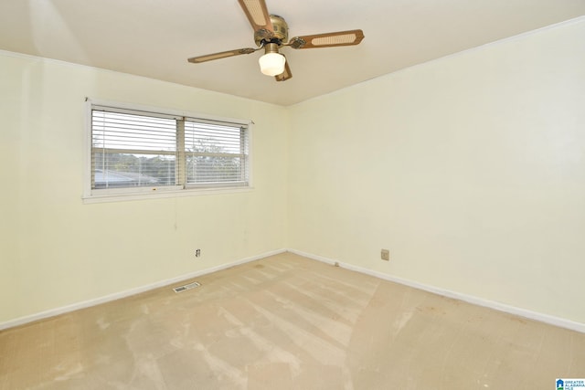 unfurnished room with light carpet and ceiling fan