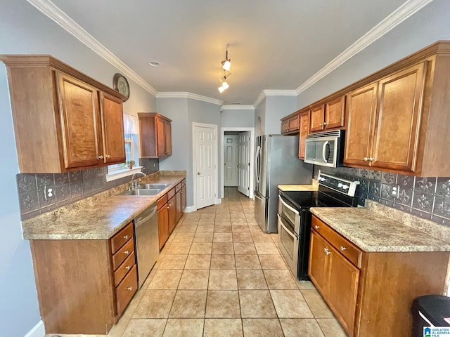 kitchen with ornamental molding, stainless steel appliances, sink, and backsplash