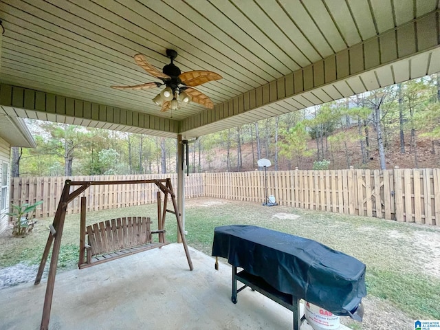 view of patio featuring ceiling fan