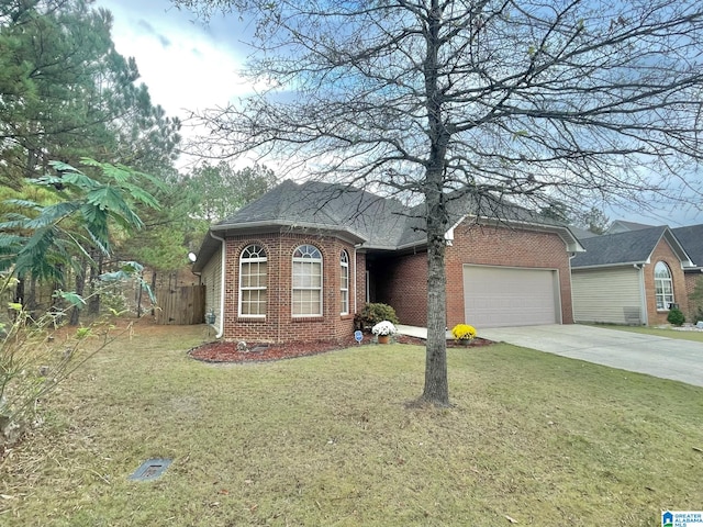 view of front facade with a garage and a front lawn