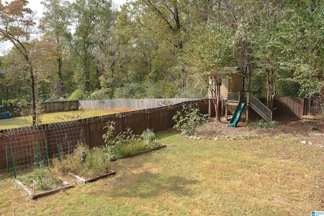 view of yard with a playground