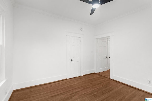 unfurnished room featuring ceiling fan, hardwood / wood-style floors, and ornamental molding