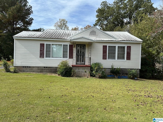 view of front of home with a front yard