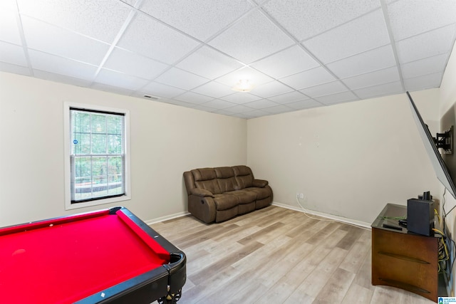 game room with hardwood / wood-style floors, pool table, and a drop ceiling