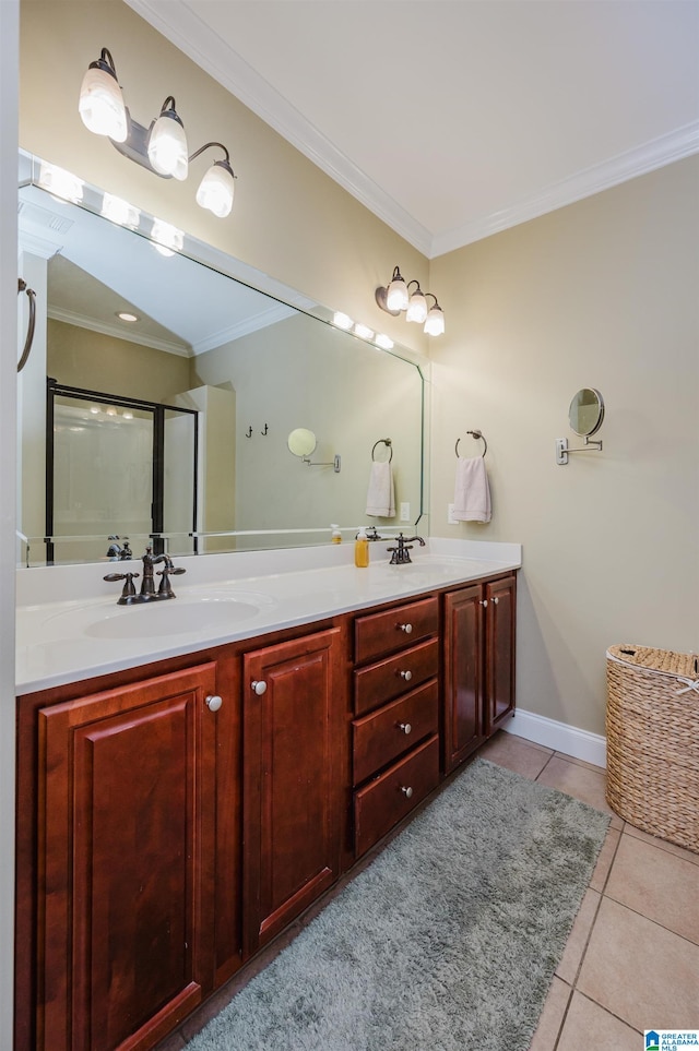 bathroom featuring ornamental molding, walk in shower, tile patterned floors, and vanity