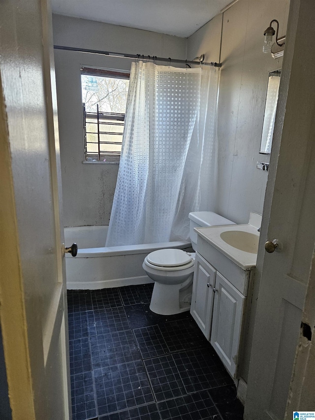 full bathroom with vanity, shower / tub combo with curtain, and toilet