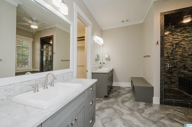 bathroom with walk in shower, ceiling fan, crown molding, and tasteful backsplash