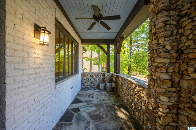 view of patio with a porch and ceiling fan