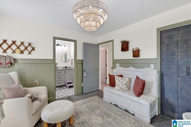 sitting room with a chandelier