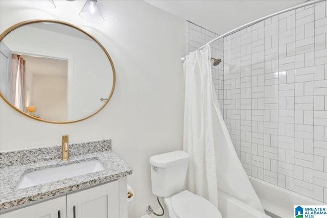 full bathroom with shower / bath combo, vanity, and toilet