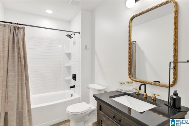 full bathroom featuring toilet, vanity, and shower / bath combo with shower curtain