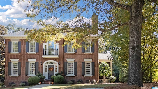 colonial house with a balcony