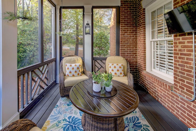 sunroom / solarium featuring a wealth of natural light