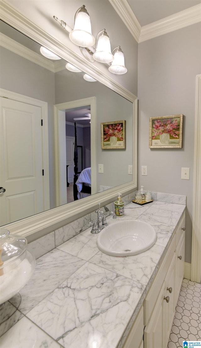 bathroom with vanity and crown molding