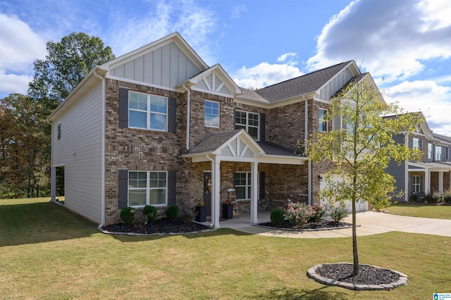 craftsman-style home with a front yard