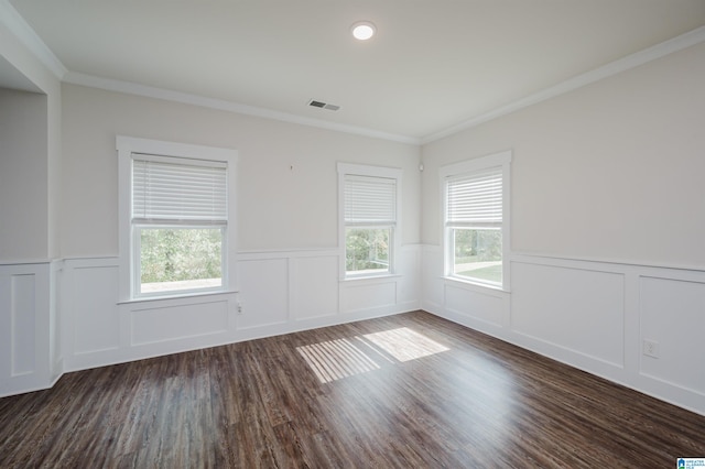 unfurnished room featuring dark hardwood / wood-style flooring, plenty of natural light, and crown molding