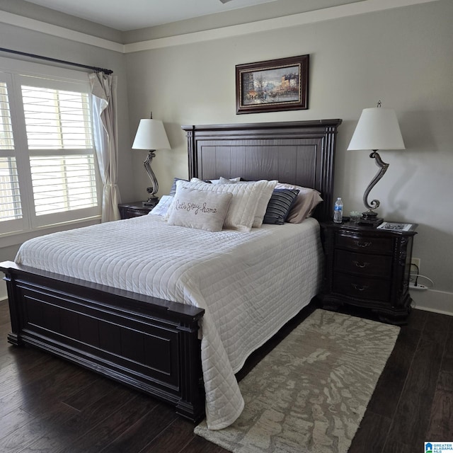 bedroom featuring dark hardwood / wood-style floors