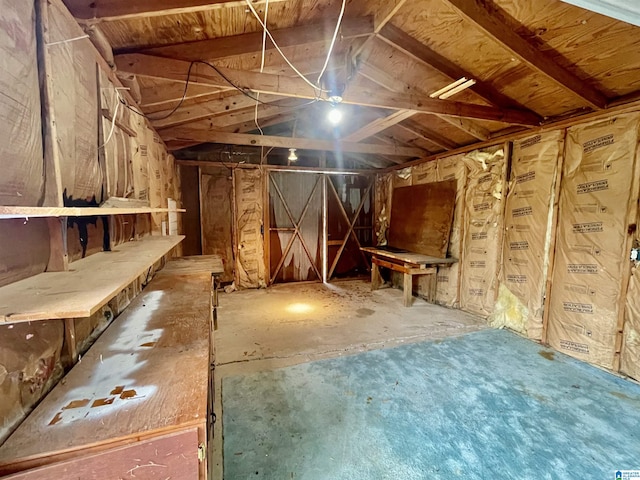 interior space featuring vaulted ceiling