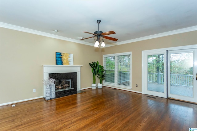 unfurnished living room featuring wood-type flooring, ceiling fan, and crown molding