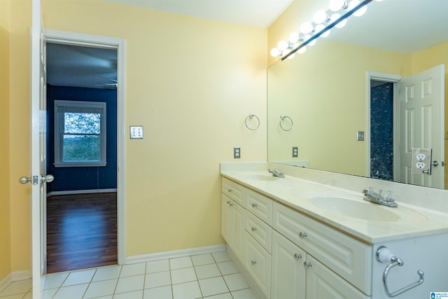 bathroom with vanity and tile patterned floors