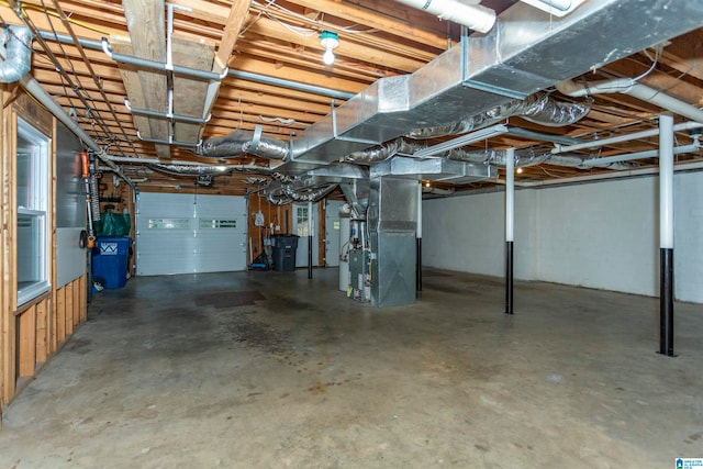 basement featuring heating unit