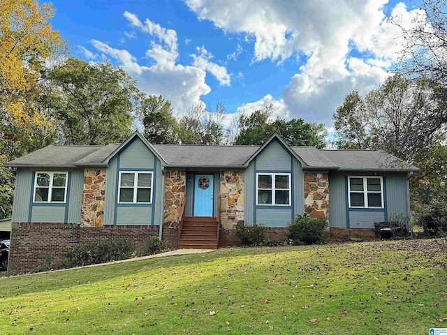 ranch-style house with a front yard