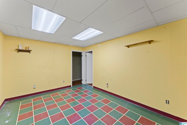 empty room with a drop ceiling