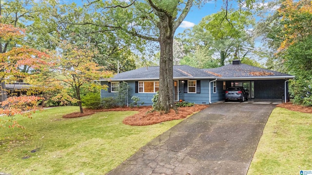 ranch-style house with a carport and a front lawn