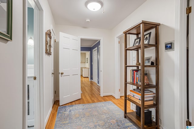 hallway featuring light hardwood / wood-style flooring