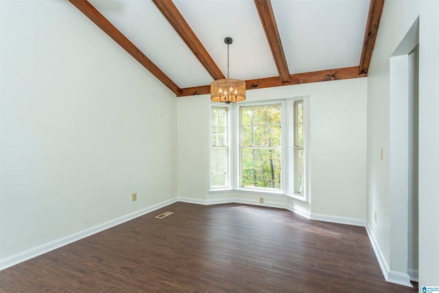 spare room featuring dark wood-type flooring, an inviting chandelier, and vaulted ceiling with beams