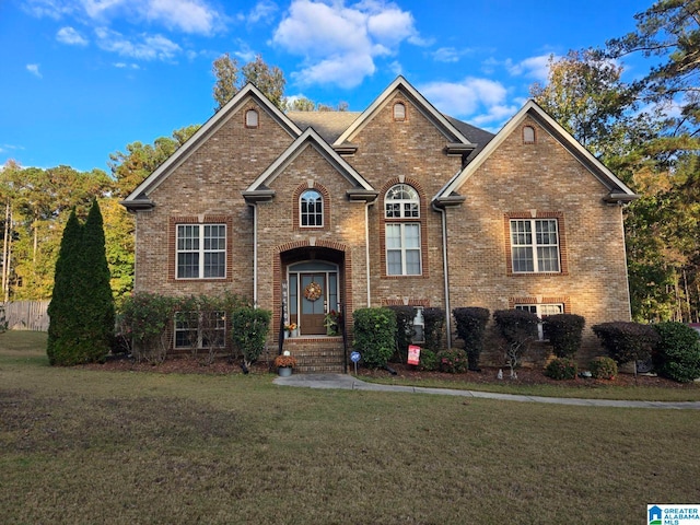 view of property with a front lawn