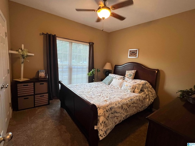 carpeted bedroom with ceiling fan