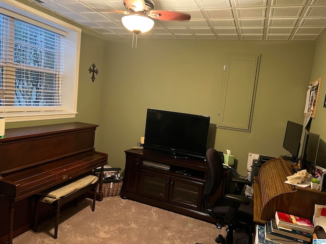 office area with light colored carpet and ceiling fan