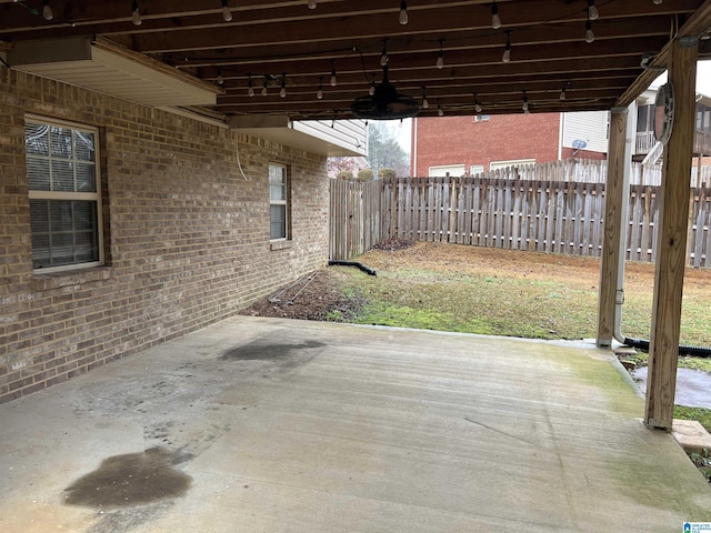 view of patio featuring ceiling fan