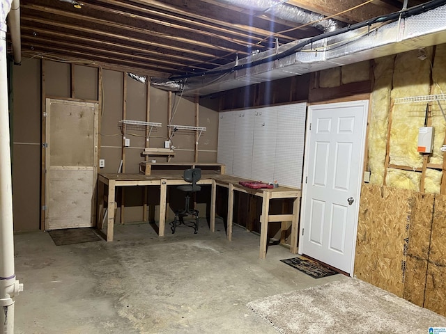 basement with a workshop area