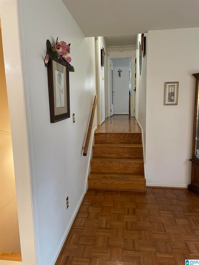 stairway with parquet floors