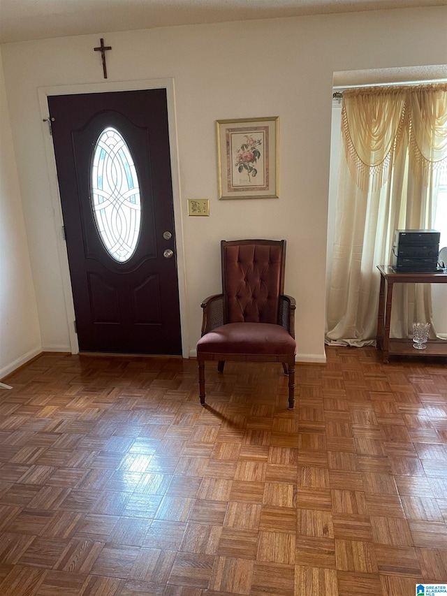 foyer with light parquet floors