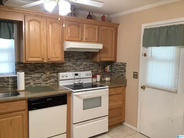 kitchen featuring ornamental molding, ceiling fan, light tile patterned floors, backsplash, and white appliances