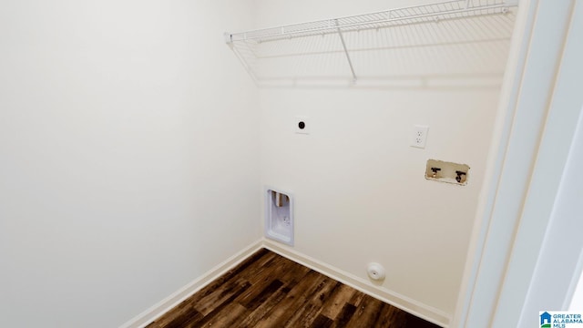 laundry area with gas dryer hookup, hookup for a washing machine, electric dryer hookup, and dark hardwood / wood-style flooring