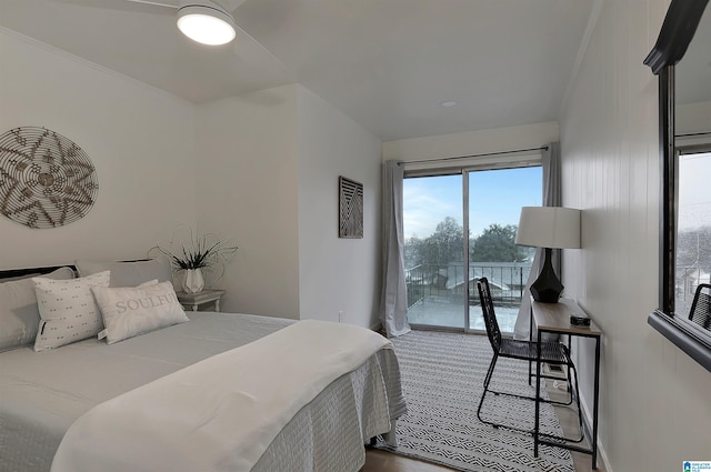 bedroom featuring crown molding, ceiling fan, and access to exterior